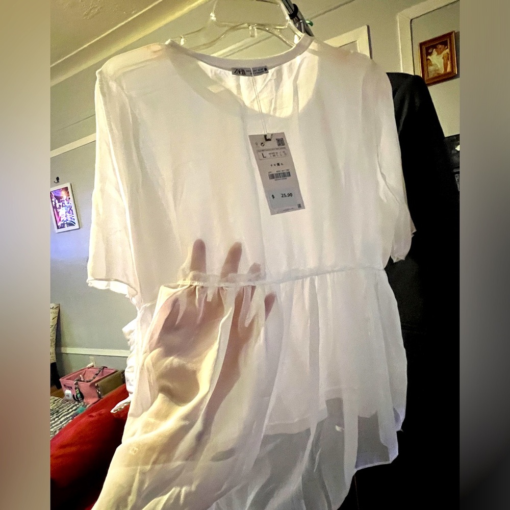 White sheer back tshirt. Brand new. Never worn